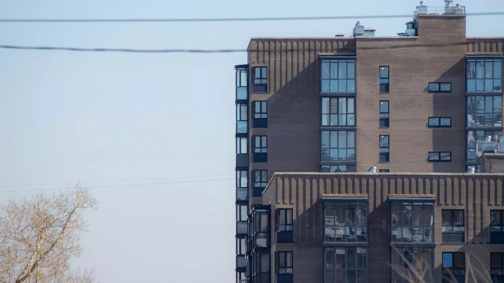 Modern residential buildings, real assets behind middle market private debt